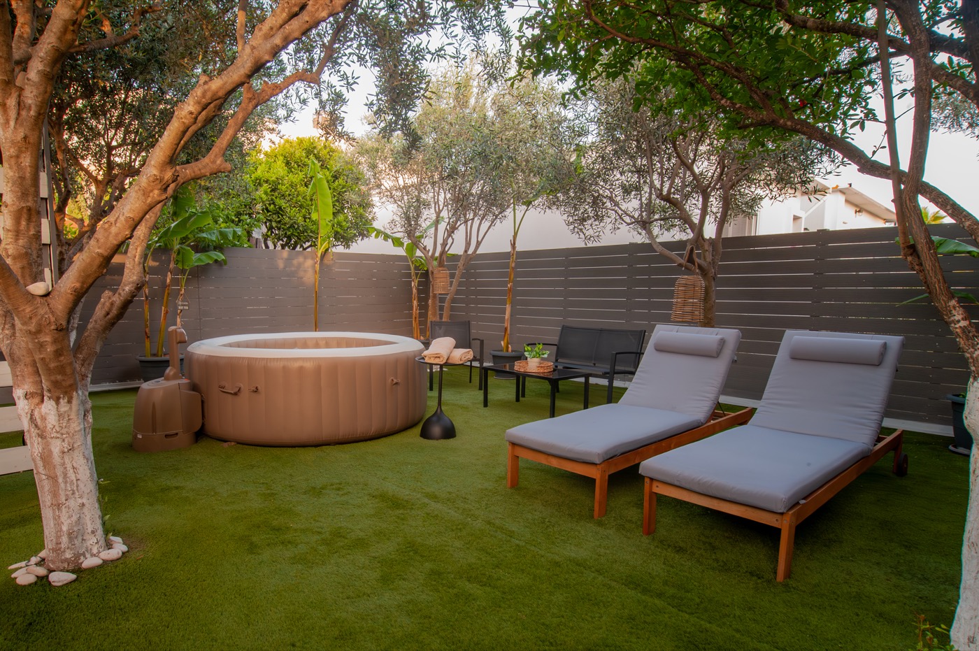 Home Away From Home garden hot tub and sun loungers
